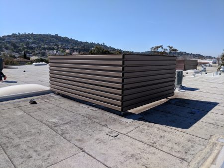B deck equipment screen on cap sheet rooftop front view